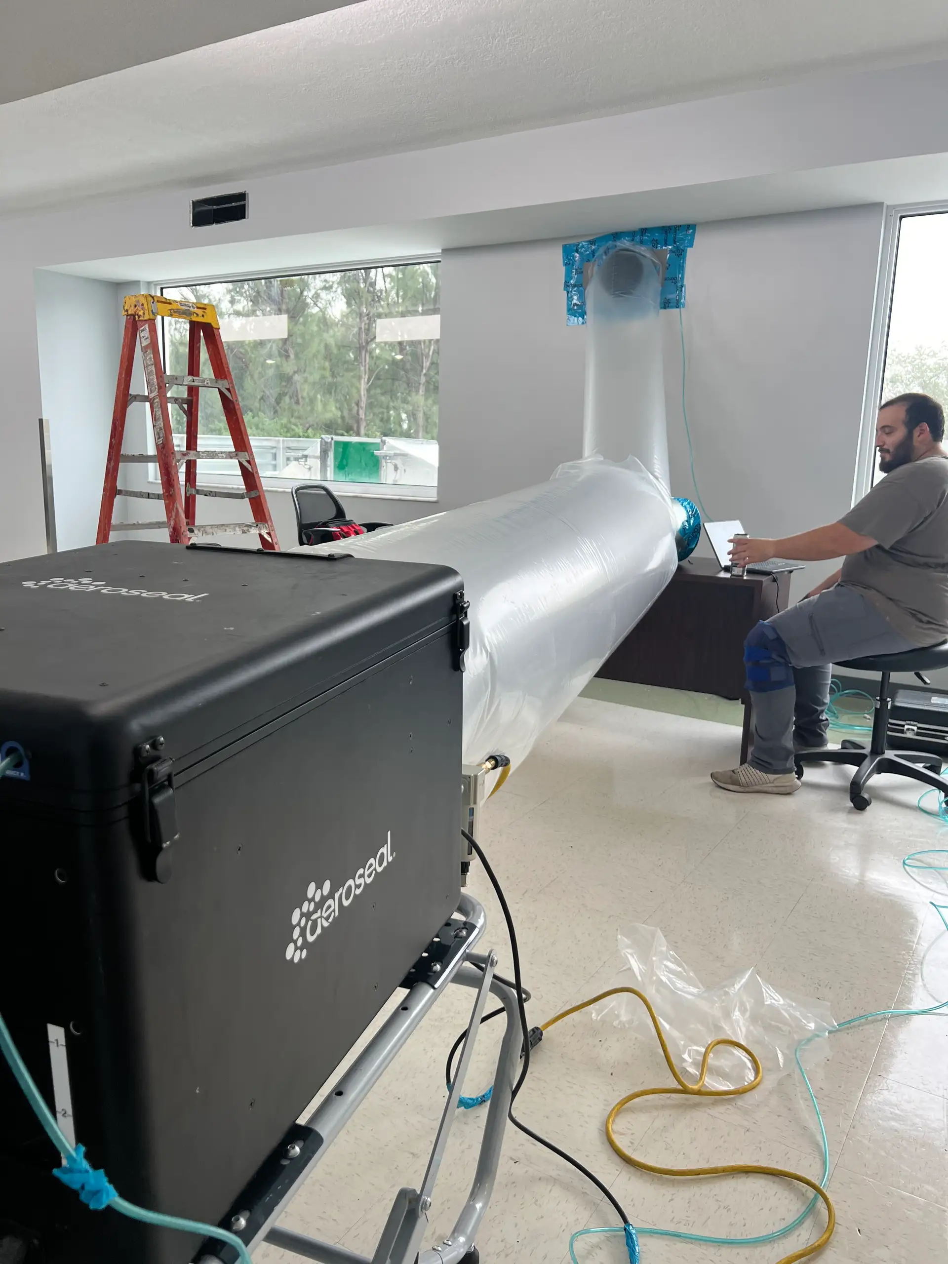 Professional Aeroseal duct and vent sealing process in Miami residential HVAC system
